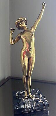 D'après Paul PHILIPPE, danseuse art déco en bronze doré le réveil Ht 35cm