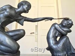 Grande sculpture Art Déco signée P. Sega, onyx marbre régule, Femme et Faune