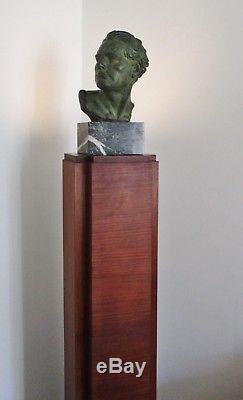 Sculpture Mermoz régule patiné bronze Art Déco et colonne éclairante De Viggo