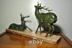 Sculpture statue animalière cerf bronze art déco patine verte socle marbre