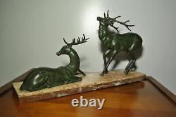 Sculpture statue animalière cerf bronze art déco patine verte socle marbre